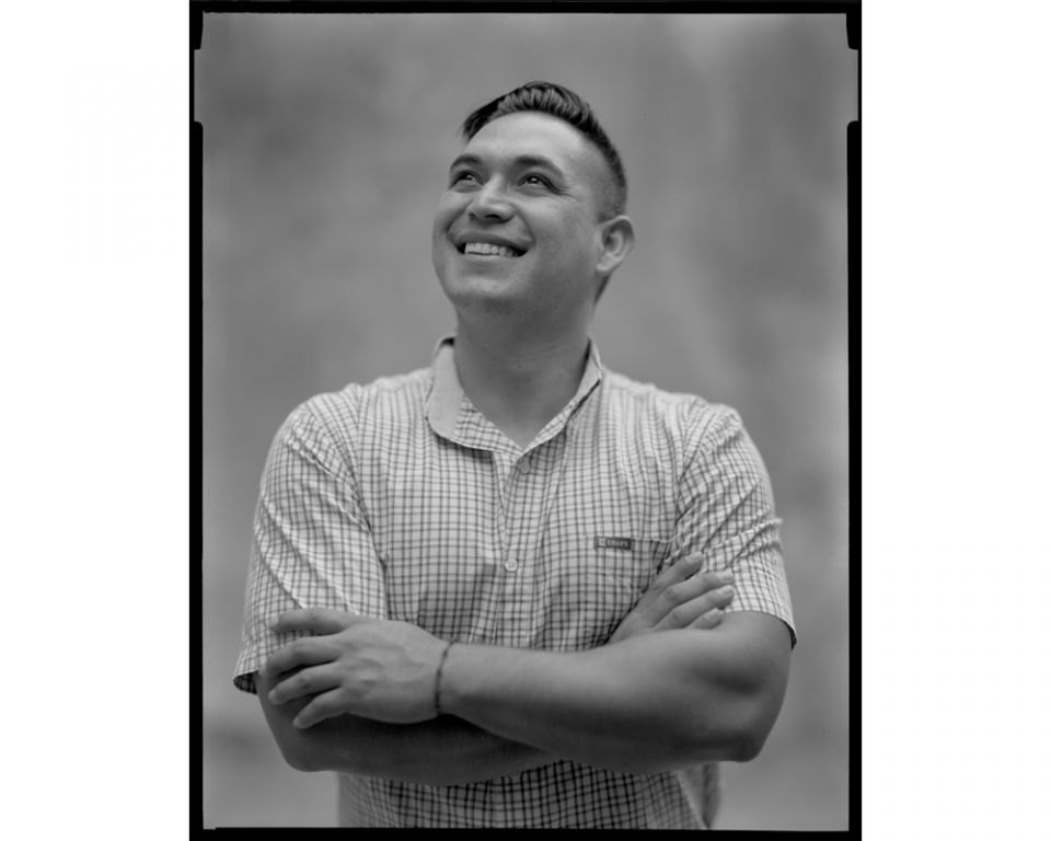 Victor Yanez Valle, a Jesuit scholastic, is director of migrant services at the migrant center. He helps expelled families get social service assistance. (Lisa Elmaleh)