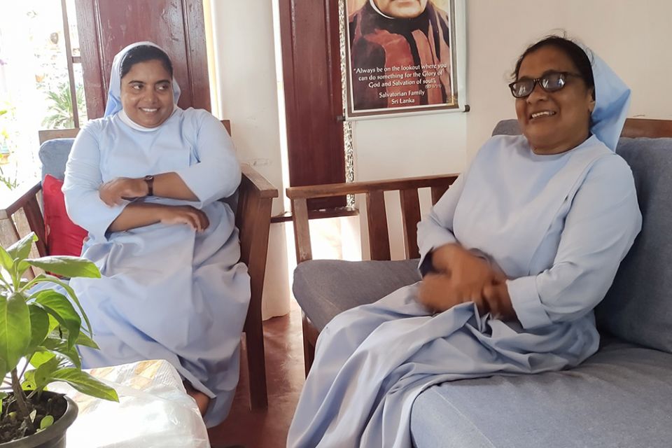 Sr. Ranjana Silvapulle (left), the superior of the Salvatorian Children's Home sits with Sr. Rajeswari Arokyanathan (right) Oct. 16 at their residence in Ilupaikulam village in the Mannar district of Sri Lanka. (Thomas Scaria)