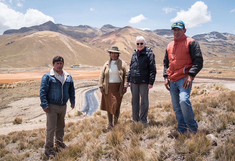 In this 2016 photo, Maryknoll Sr. Patricia Ryan, second from right, is seen with Simon Orihuela, in a blue jacket; Ubaldo Layme Jile, wearing a blue cap; and Feliza Quispe Apaza, wearing a brown skirt at Condoraque, Puno Department, Peru. (Nile Sprague)