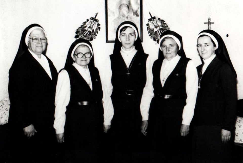 Leaders of Sisters of St. Basil the Great in Italy visit Romanian community leaders in 1989. At the time, the clandestine community in Romania was constantly watched by Communist Party security agents. Sr. Ioana Bota is at center.