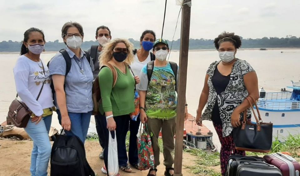 A group from the ant-trafficking network A Cry for Life prepares to leave for a trip down the Amazon River to work with women. (Caterina Ingelido)