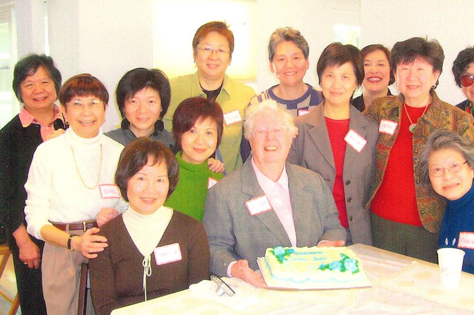 Maryknoll Sr. Joan Delaney, center, at a birthday party in Menlo Park, California, Feb. 11, 2007, with alumna of Hong Kong's Maryknoll Convent School and Maryknoll Secondary School (Courtesy of Maryknoll Sisters)