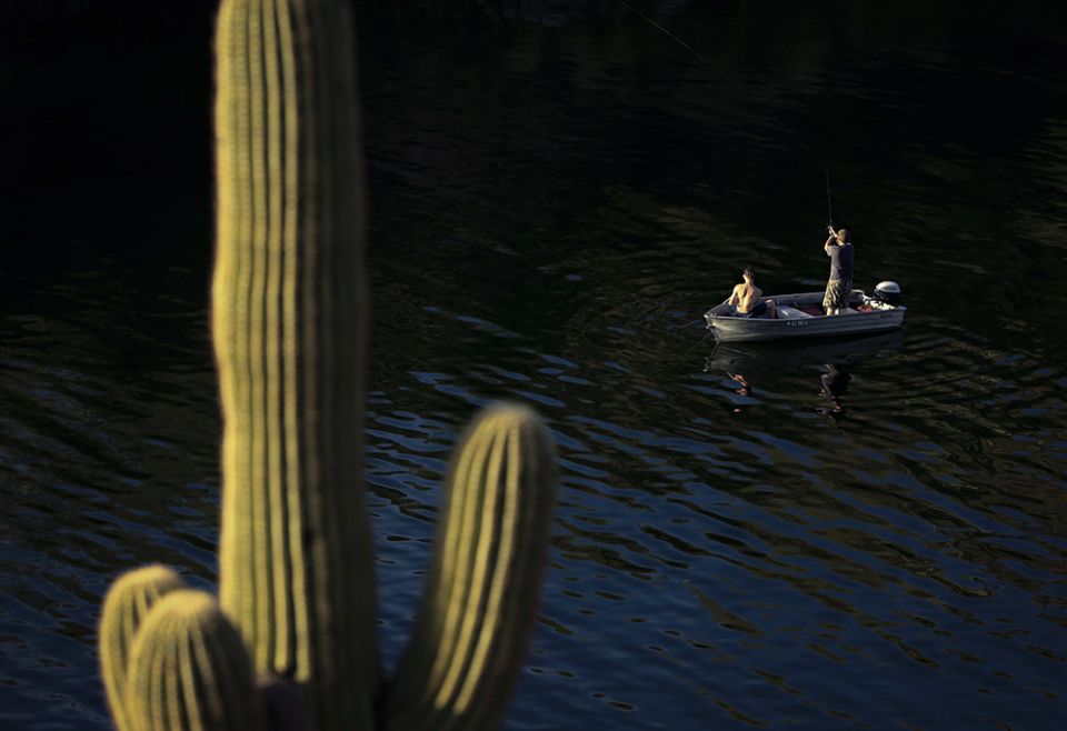 Men fish in Saguaro Lake in the Tonto National Forest outside Mesa, Arizona, in March 2016. (CNS/Nancy Wiechec) Men fish in Saguaro Lake in the Tonto National Forest outside Mesa, Arizona, in March 2016. (CNS/Nancy Wiechec)