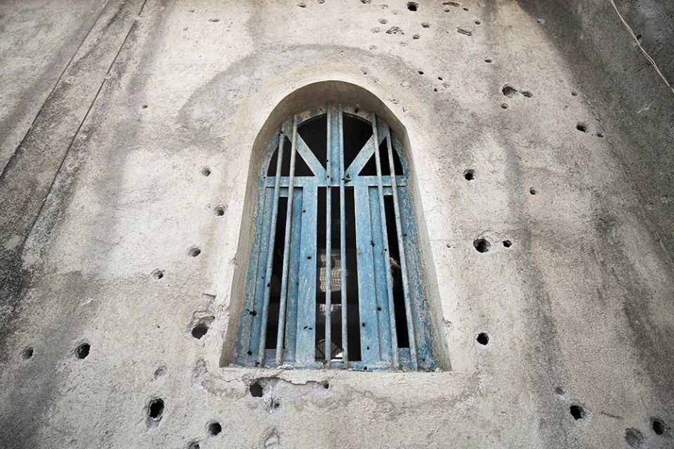 Bullet holes are seen on a mosque in Kasagita, Ethiopia, Feb. 25. The damage came from fighting between the Ethiopian National Defense Force and the Tigray People's Liberation Front. (CNS/Reuters/Tiksa Negeri)