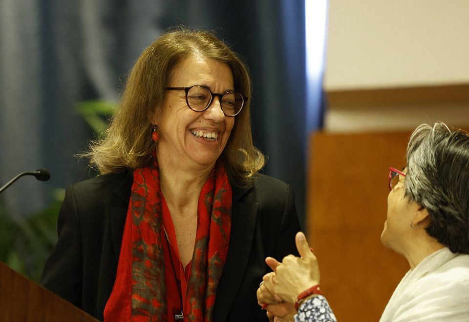 Sr. Nurya Martinez-Gayol Fernández, left, speaks with Sr. Aurora Torres Hernandez as she gives a talk May 3 during the plenary assembly of the International Union of Superior Generals in Rome. (CNS/Paul Haring) Sr. Nurya Martinez-Gayol Fernández, left, speaks with Sr. Aurora Torres Hernandez as she gives a talk May 3 during the plenary assembly of the International Union of Superior Generals in Rome. (CNS/Paul Haring) Hernandez
