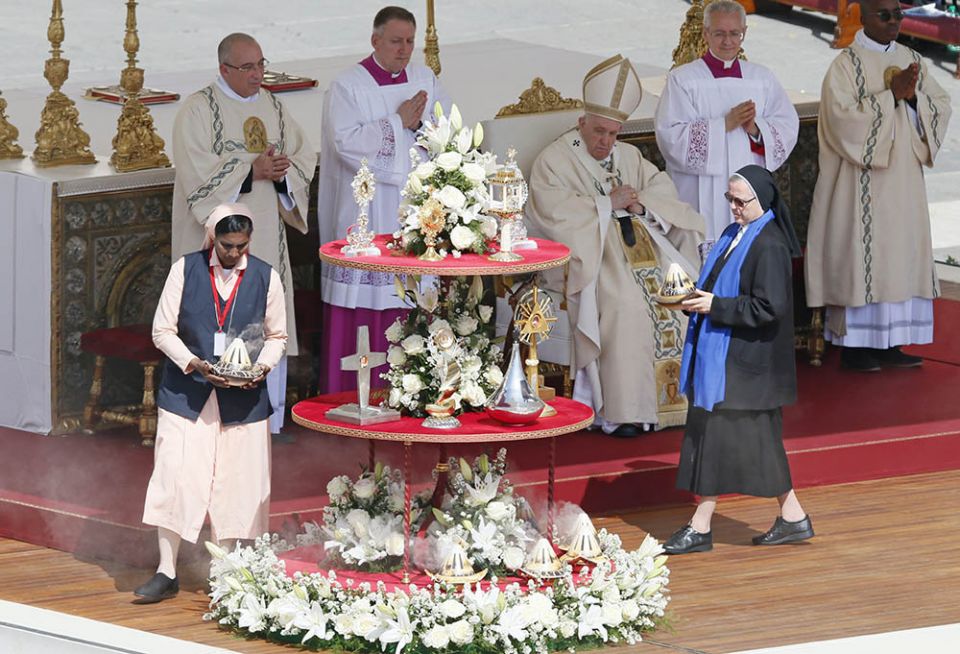 Pope Francis celebrates Mass for the canonization of 10 new saints, including four women religious, May 15 in St. Peter's Square at the Vatican. (CNS/Paul Haring)