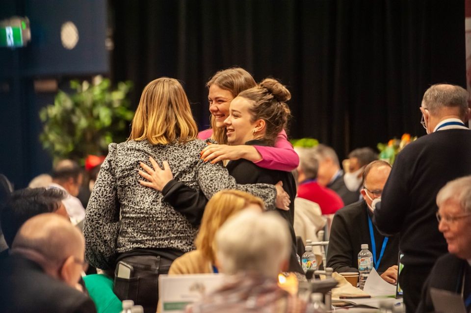 Women embrace on the final day of the Second Assembly of the Plenary Council of the Australian Catholic church in Sydney on July 8. (CNS/The Catholic Weekly/Giovanni Portelli)