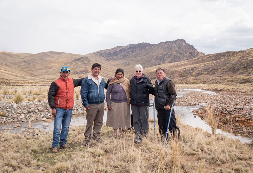 In this 2016 photo, Sr. Patricia Ryan, second from right, is seen with Cristobal Yugra Villanueva, on crutches; Simon Orihuela, in a blue jacket; and Ubaldo Layme Jile, with a blue cap; in Condoraque, Puno Department, Peru. (Nile Sprague)