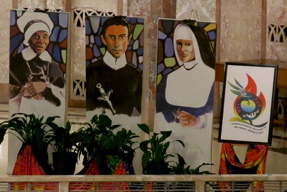 IHM founders display Banners portraying Mother Mary Lange, founder of the Oblate Sisters of Providence, Redemptorist Fr. Louis Gillet and Mother Theresa Maxis Duchemin, founders of the Sisters, Servants of the Immaculate Heart of Mary (IHM Communication Office of Monroe)