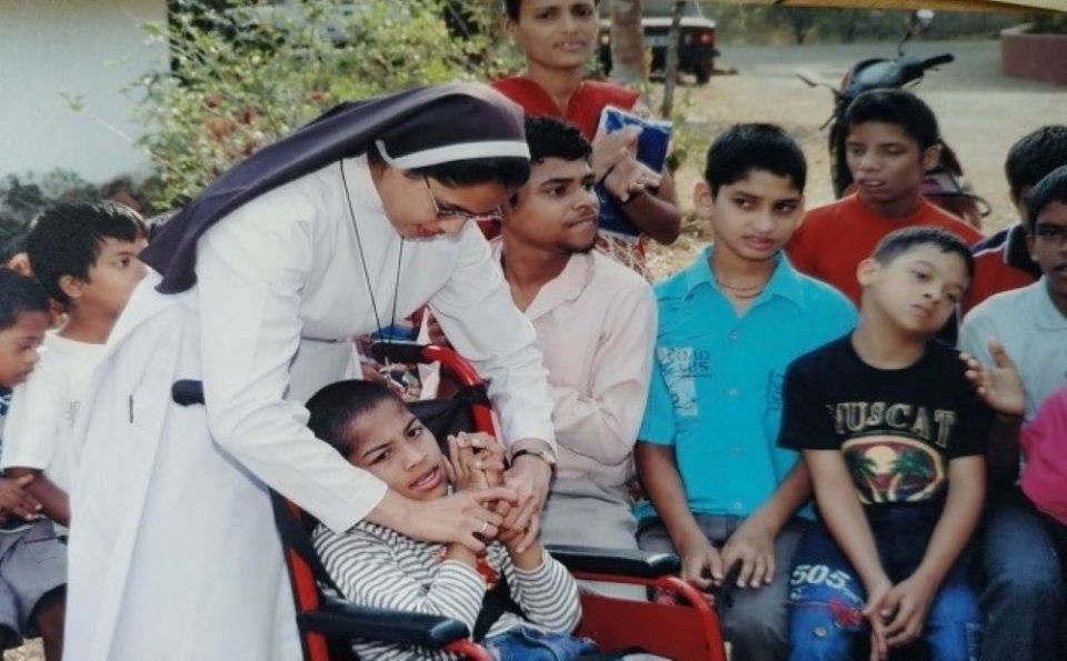 Sr. Monica Coelho of the Sisters of Holy Family of Nazareth of Sancoale Goa, India, with students at the Centre for the Differently Abled, a project of Caritas Goa. (Courtesy of Centre for the Differently Abled)