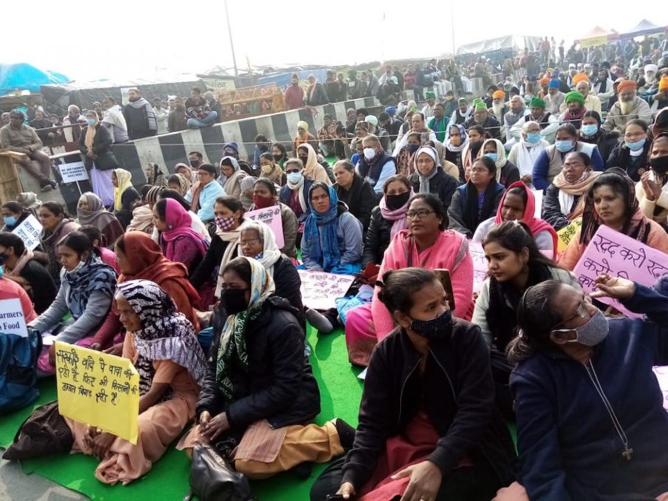 People sit in solidarity with the farmers at the Ghazipur border to India's capital city, Delhi, after new laws were passed in September. (Dorothy Fernandes)