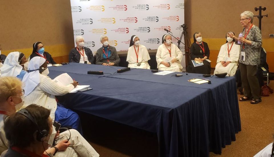 Dominican Sr. Margaret Mayce of Amityville, New York, right, speaks to an informal gathering of Dominican sisters during the May 2-6 plenary of the International Union of Superiors General in Rome. (GSR photo/Chris Herlinger)
