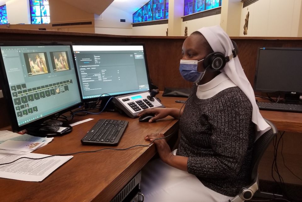 Sr. Teresia Mutiso streams Mass to those unable attend due to the coronavirus pandemic at St. Thomas Aquinas Church in Binghamton, New York. (Provided photo)