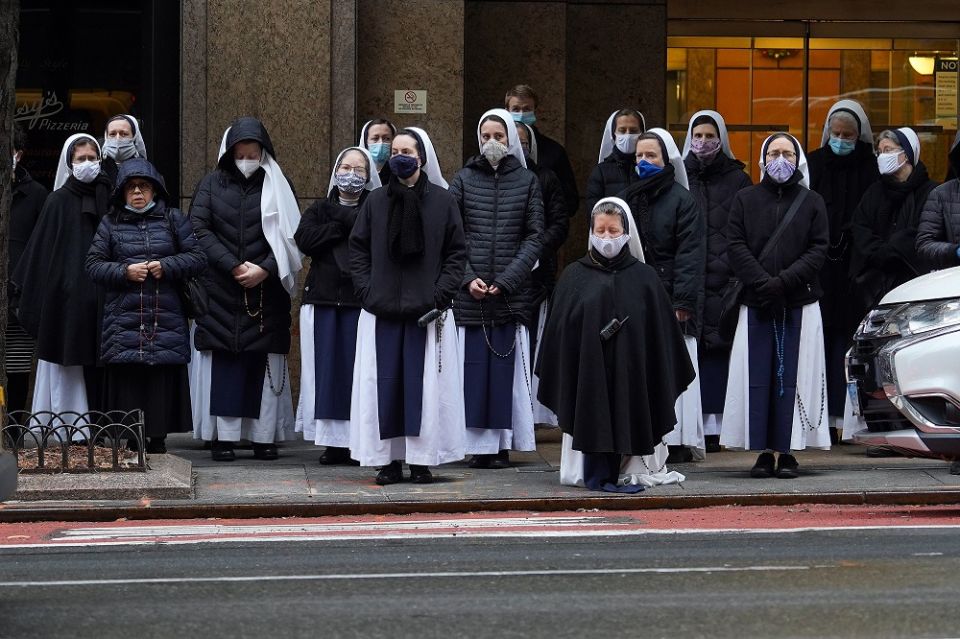 Members of the Sisters of Life and other advocates against abortion pray across the street from an abortion clinic in New York City on Dec. 28, 2020, the feast of the Holy Innocents. (CNS/Gregory A. Shemitz)