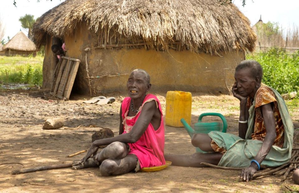 South Sudanese women sit outside their shelter in Genyiel county, Unity State, South Sudan, in this Sept. 24, 2020, file photo. Pope Francis had planned to visit Congo and South Sudan in early July, but that trip was canceled because of his health. 