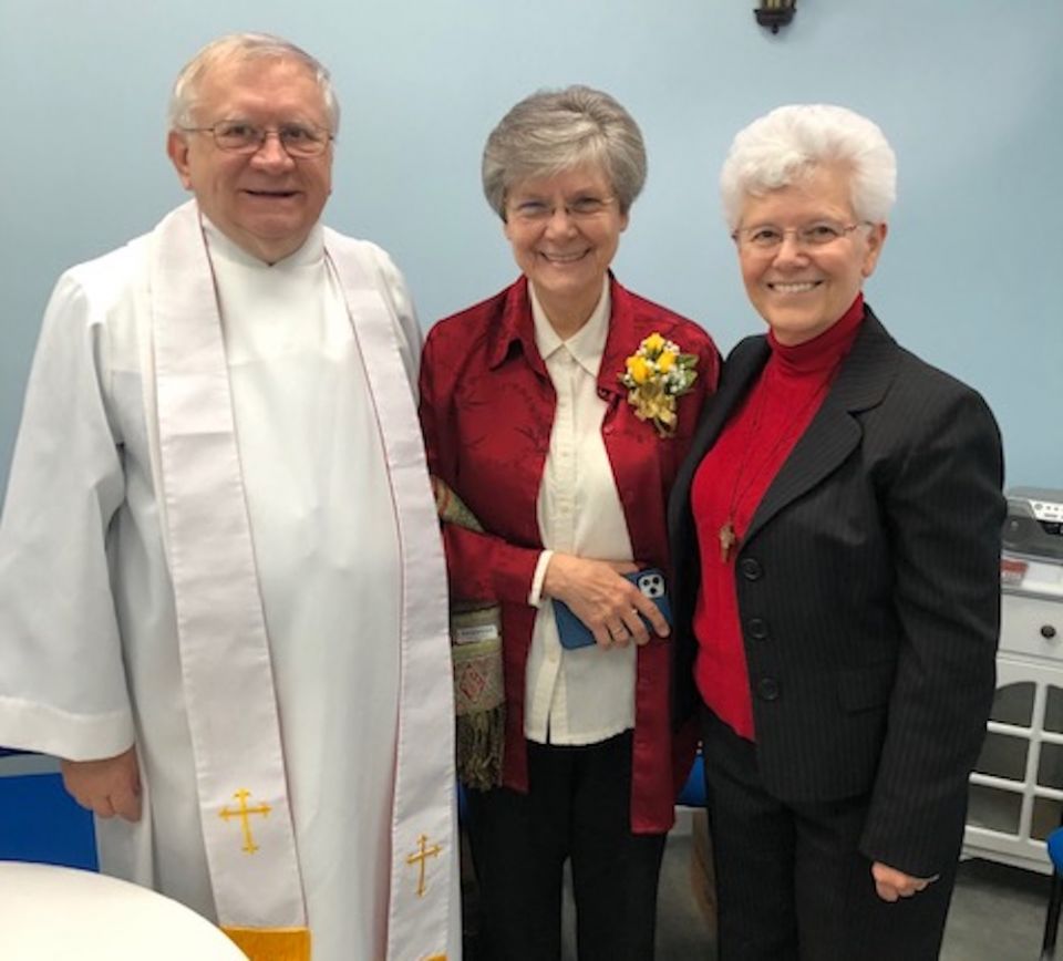 Sr. Carole Riley, right, a member of the Sisters of Divine Providence who directs the West Virginia Institute for Spirituality, stands with Ursuline Sr. Cheryl Clemons, center, and the institute's chaplain, Fr. Bill Petro, Jan. 6, 2020. (Provided photo) Fr. Bill Petro, Sr. Carole Riley, Sr. Cheryl Clemons standing together
