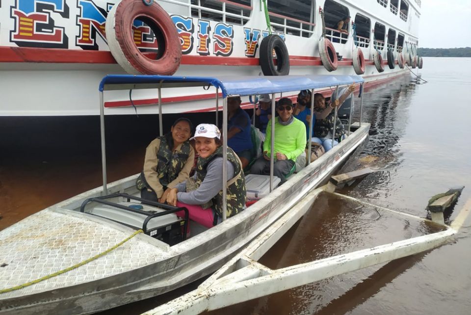 The missionary team, including two sisters, two aspirants to religious life, a priest and a seminarian, travels the Rio Negro in the Amazon region of Brazil in August 2020 to help isolated communities (Courtesy of Jonas Melgueiro)