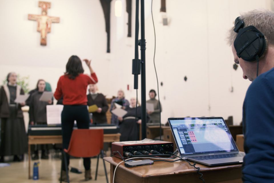 James Morgan, right, checks the recording levels as the sisters perform some of the music to which St. Clare's writing was set for the first time for the album "Light for the World." (Morgan Pochin Music Productions) James Morgan, right, checks the recording levels as the sisters perform some of the music to which St. Clare's writing was set for the first time for the album "Light for the World." (Morgan Pochin Music Productions)