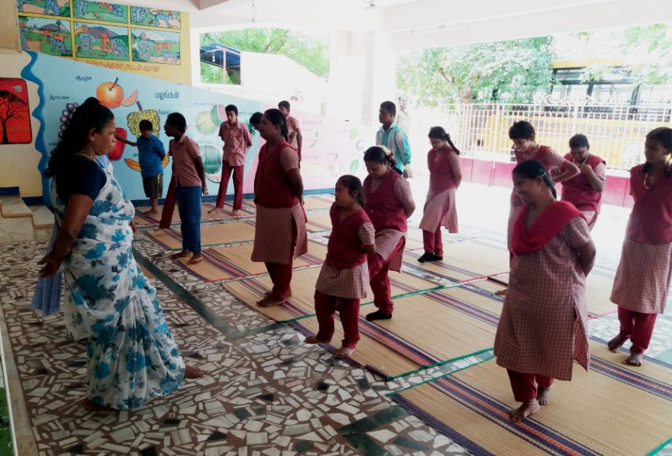 Students follow the yoga instructor at Asha Deepam in Trichy, Tamil Nadu, southern India. (Philip Mathew) Students follow the yoga instructor at Asha Deepam in Trichy, Tamil Nadu, southern India. (Philip Mathew)