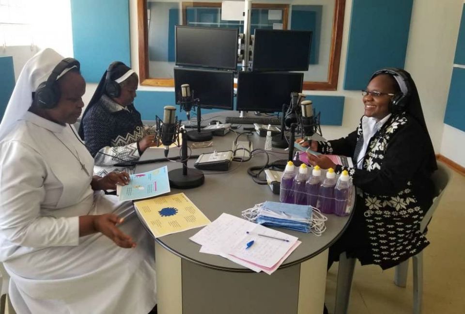 Dominican Sr. Astridah Banda, right, and other sisters get ready for the COVID-19 program on Radio Maria: Yatsani Voice in Lusaka, Zambia.