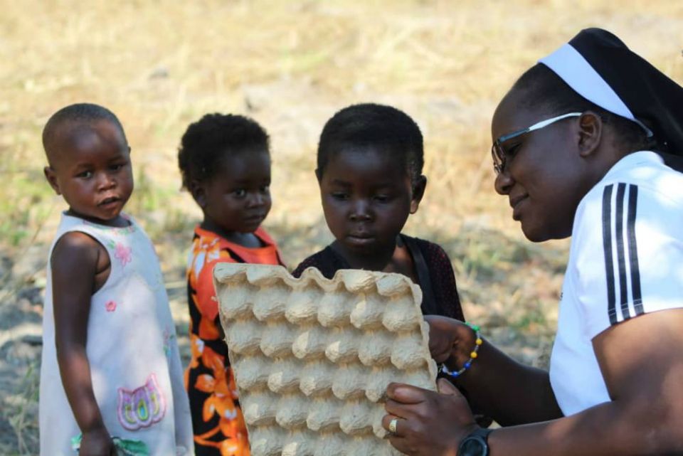Sr. Astridah Banda, who is also a social worker, provides literary classes to children in rural Zambia who have not started formal school to encourage an interest in learning. (Provided photo) Sr. Astridah Banda, who is also a social worker, provides literary classes to children in rural Zambia who have not started formal school to encourage an interest in learning. (Provided photo)