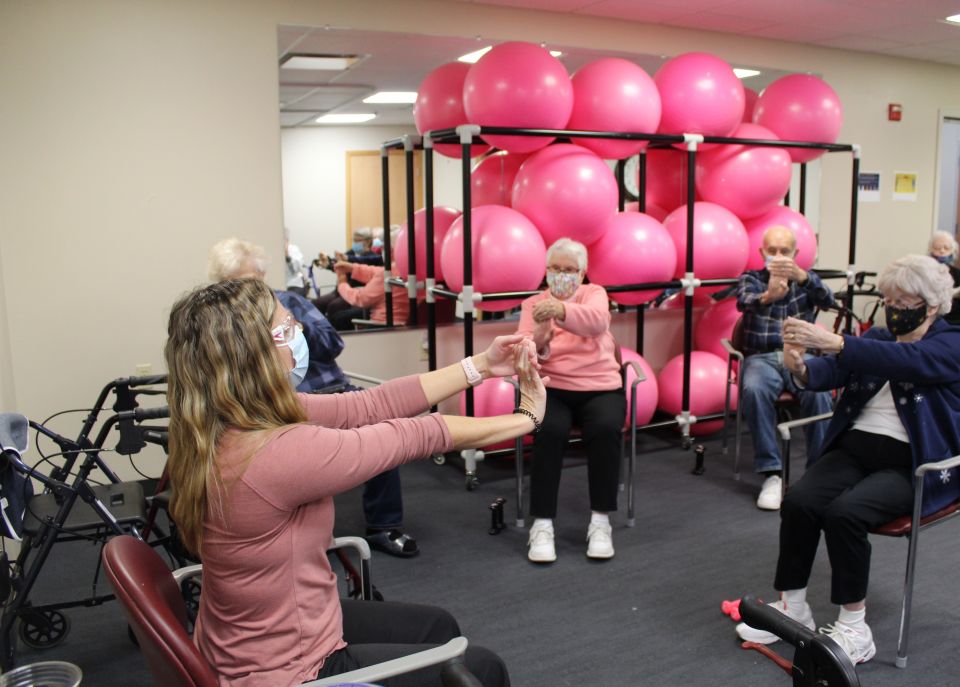 Residents at Benedictine Living Community in Winona, Minnesota, participate in a strengthening exercise class. (Courtesy of Benedictine)