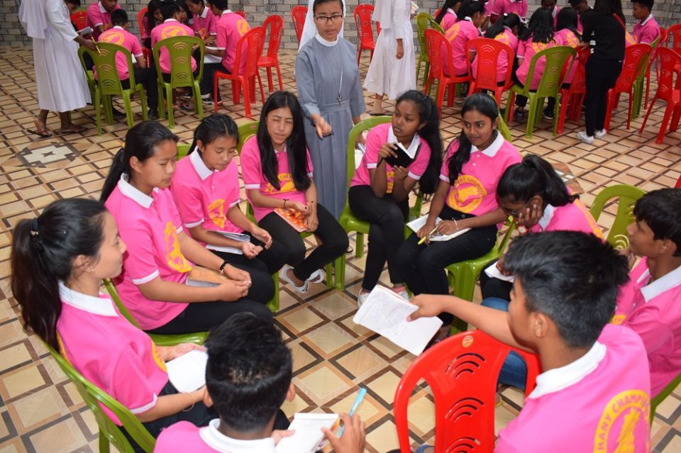 Bethany Champions group discussion Students discuss life goals at an event of the Bethany Champions, a teenage formation program launched by the Bethany Sisters. (Courtesy of the Bethany Sisters)