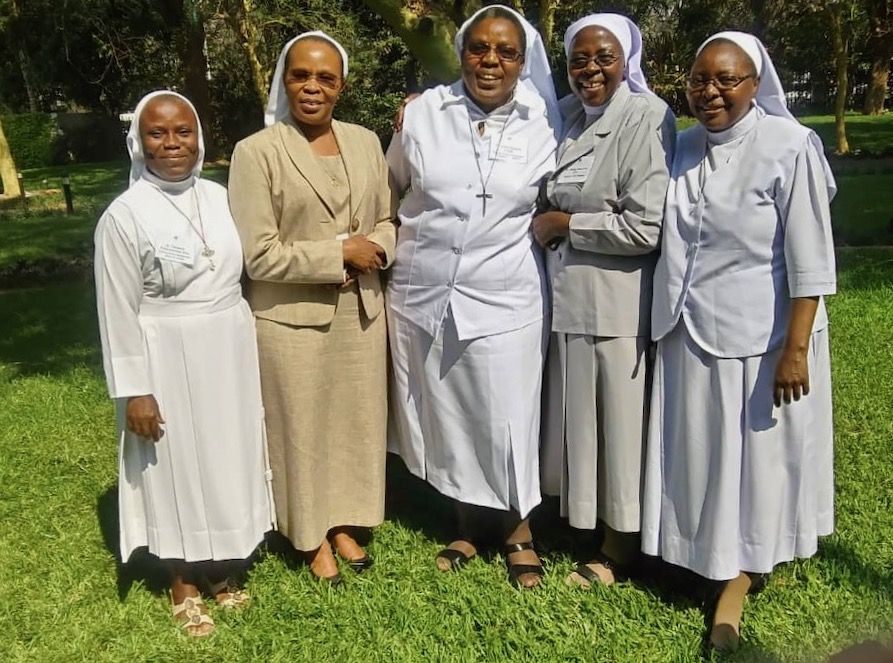 This photo at a Hilton Foundation convening of Sisters in Zambia in October 2019, shows some of the sisters involved in the African Sisters Education Collaborative. From left: Sr. Florence Emurayeveya, of the Sisters of the Eucharistic Heart of Jesus; Sr.