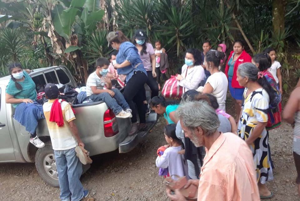 Sisters and associates of the Congregation of Notre Dame have been helping distribute food and supplies in the hurricane-hit area of Santa Barbara, Honduras. Associate Fanny Bonilla, in the blue shirt, and Sr. Lilian Barrera, holding the red bag, are dist
