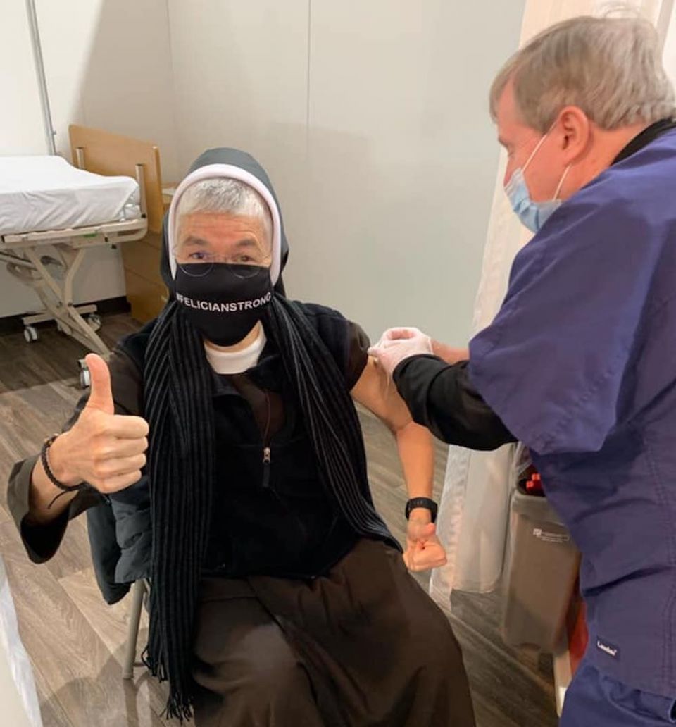 Felician Sr. Marilyn Minter receives her first dose of the COVID-19 vaccine at New Bridge Hospital in Paramus, New Jersey, before returning to serve at the Felician Mission in Haiti. (Felician Sisters of North America)