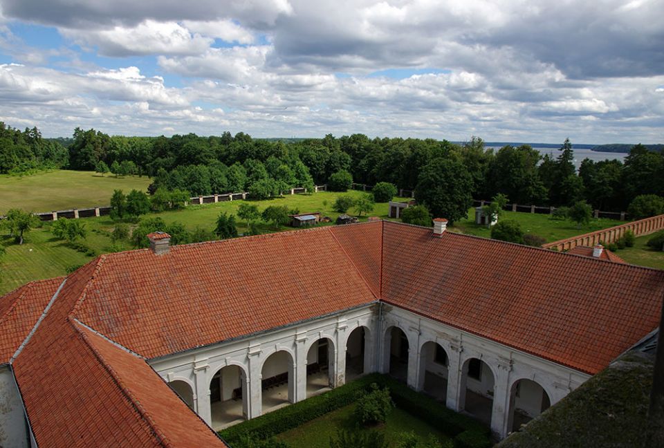 A view from the Pazaislis Monastery's central domed church belltower, which is surrounded by additional buildings that form several courtyards. In the distance is the Kaunas Reservoir along the Neman River. (Courtesy of the Sisters of St. Casimir)