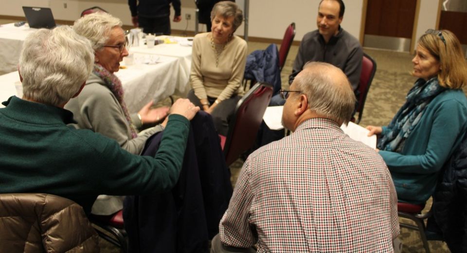 Parishioners from St. Rose of Lima Parish and members of Congregation B'Nai Jeshuran of Short Hills participate in a discussion group. (Zach Hrunick)
