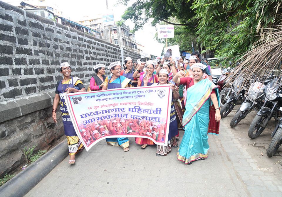 Sr. Christin Mary (front row, right), a member of the Missionary Sisters of the Immaculate Heart of Mary and a coordinator of the National Domestic Workers' Movement, leads a march of domestic workers in Mumbai in June 2017. (Provided photo)