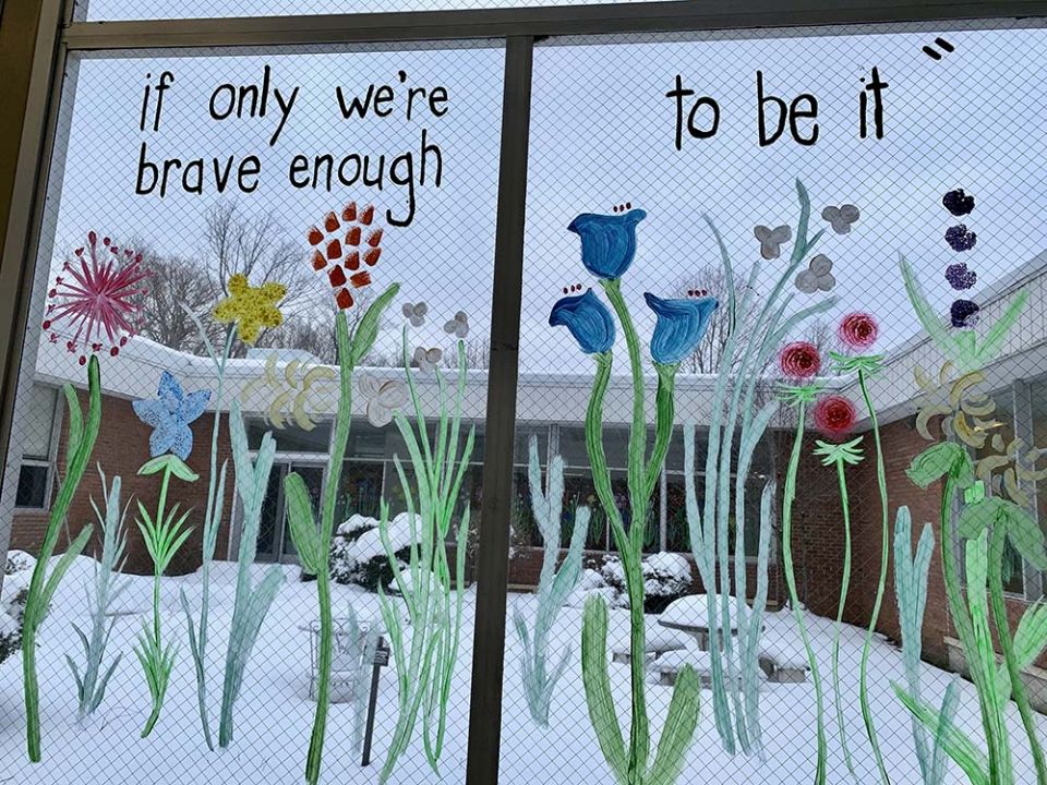 A quote from Amanda Gorman's poem "The Hill We Climb" on windows at Collier High School (Maddie Thompson) A quote from Amanda Gorman's poem "The Hill We Climb" on windows at Collier High School (Maddie Thompson)