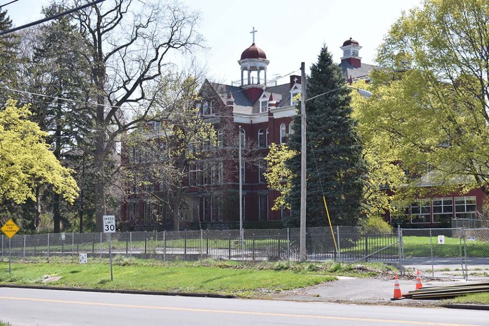 The motherhouse of the Sisters of St. Francis in Syracuse, New York, stands empty and crumbling. The building was sold to developers after five communities merged to form the Sisters of St. Francis of the Neumann Communities.