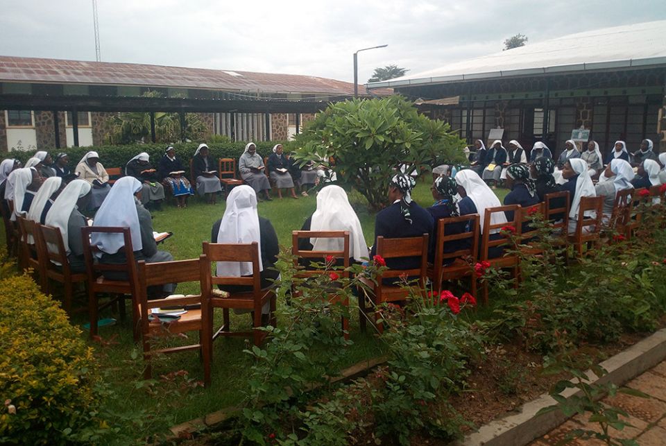Members of the Tertiary Sisters of St. Francis in Shisong, Cameroon, meet during a previous Earth Day commemoration. The congregation's many environmental projects include community gardens that serve as a demonstration site to boost soil fertility. The g Members of the Tertiary Sisters of St. Francis in Shisong, Cameroon, meet during a previous Earth Day commemoration. The congregation's many environmental projects include community gardens that serve as a demonstration site to boost soil fertility. The g