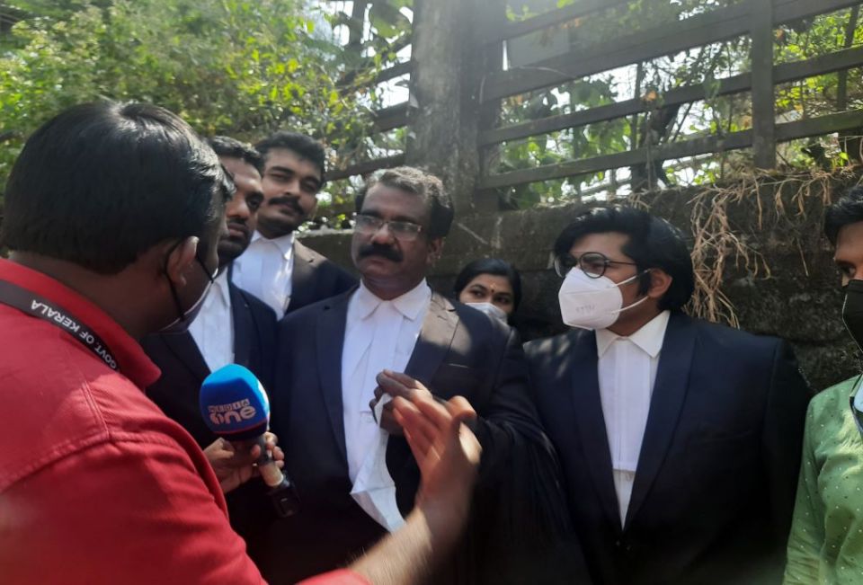 C. S. Ajay, center, a member of the legal defense team of Bishop Franco Mulakkal of Jalandhar, talks to reporters Jan. 14, 2022, about the acquittal of the prelate in the historic nun rape case by a trial court in Kottayam, Kerala. (Saji Thomas)
