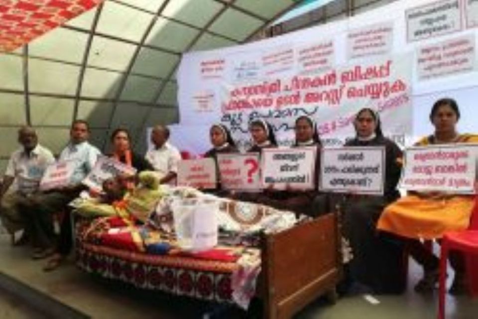 In this September 2018 file photo, Missionaries of Jesus and supporters stage a sit-in near the High Court of Kochi in the southwestern Indian state of Kerala, demanding the arrest of Bishop Franco Mulakkal of Jalandhar. 