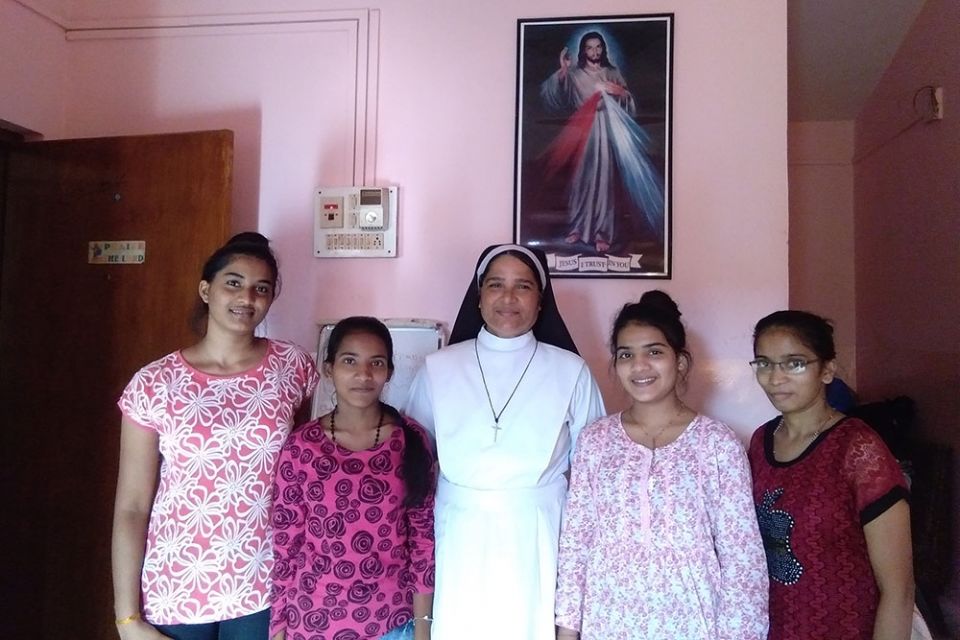 Holy Family of Nazareth Sr. Lourenca Marques, center, with students, from left, Savitri Harijan, Aswini Gaunder, Sangeeta Harijan and Pinky Gaunder at Asha Sadan in Baina in Goa, western India (Lissy Maruthanakuzhy)