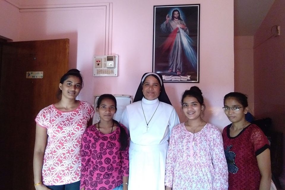 Holy Family of Nazareth Sr. Lourenca Marques, center, with students, from left, Savitri Harijan, Aswini Gaunder, Sangeeta Harijan and Pinky Gaunder at Asha Sadan in Baina in Goa, western India (Lissy Maruthanakuzhy) Holy Family of Nazareth Sr. Lourenca Marques, center, with students, from left, Savitri Harijan, Aswini Gaunder, Sangeeta Harijan and Pinky Gaunder at Asha Sadan in Baina in Goa, western India (Lissy Maruthanakuzhy)