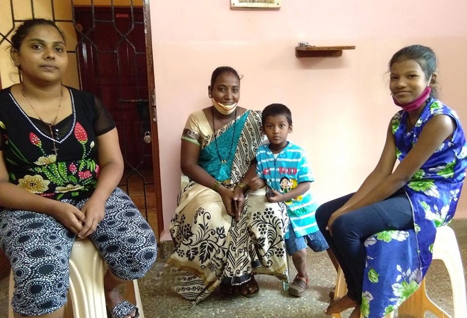 Kasturi Rupali, left, visits with her aunt, Laxmi Malkar, center, and Malkar’s children at Asha Sadan, Baina, in the Indian state of Goa. (Lissy Maruthanakuzhy) Kasturi Rupali, left, visits with her aunt, Laxmi Malkar, center, and Malkar’s children at Asha Sadan, Baina, in the Indian state of Goa. (Lissy Maruthanakuzhy)