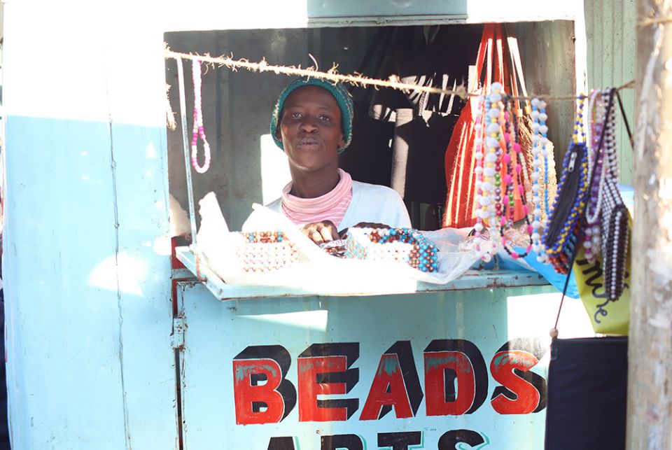 Mary Wanjiku, 26, is pictured inside her beadwork shop along a busy junction in Limuru, a town in central Kenya. (Wycliff Oundo) Mary Wanjiku, 26, is pictured inside her beadwork shop along a busy junction in Limuru, a town in central Kenya. (Wycliff Oundo)