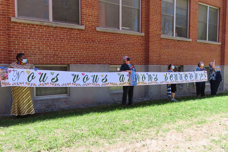 Sisters of Providence held a banner to let other sisters in the community who were isolated because of COVID-19 restrictions know they were appreciated and loved. (Courtesy of the Sisters of Providence) Sisters of Providence held a banner to let other sisters in the community who were isolated because of COVID-19 restrictions know they were appreciated and loved. (Courtesy of the Sisters of Providence)
