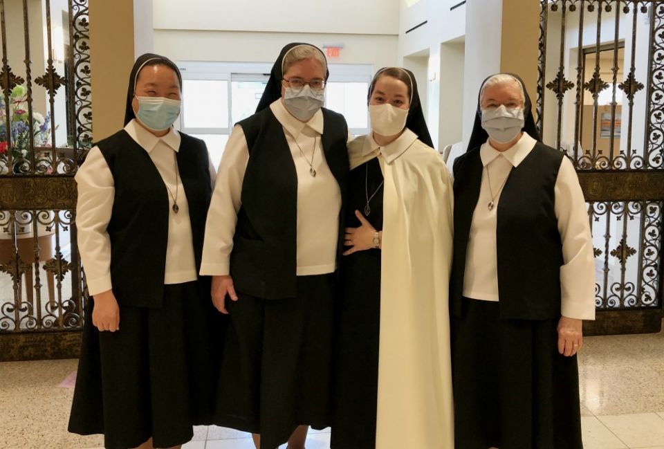From left, Sisters of Christian Charity Clara, Ann Marie, Mary Amata and Gerardine celebrate the perpetual profession of Sister Mary Amata Aug. 15 in Mendham, New Jersey. (Provided photo) From left, Sisters of Christian Charity Clara, Ann Marie, Mary Amata and Gerardine celebrate the perpetual profession of Sister Mary Amata Aug. 15 in Mendham, New Jersey. (Provided photo)