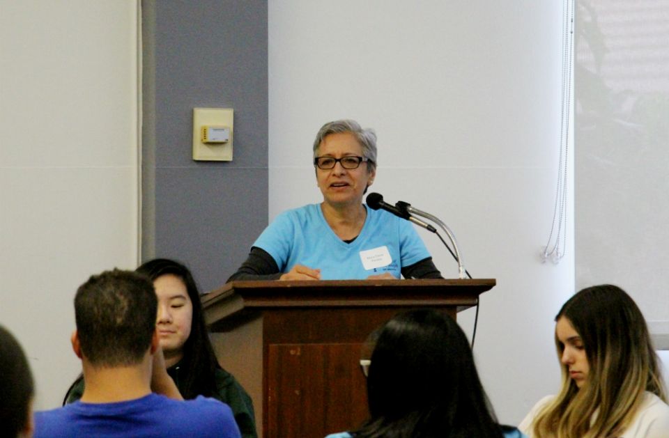 Maria Elena Perales, director of the St. Joseph Justice Center in Orange, California, gives opening remarks to participants in the Sept. 28 day of service. (Courtesy of the Sisters of St. Joseph of Orange)