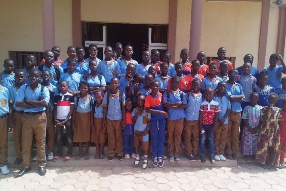Students of the Daughters of Charity's inclusive school in the Diocese of Nouna, Burkina Faso, pose for a photo after the opening Mass for the new academic session. (Courtesy of Janet E. Deinanaghan)