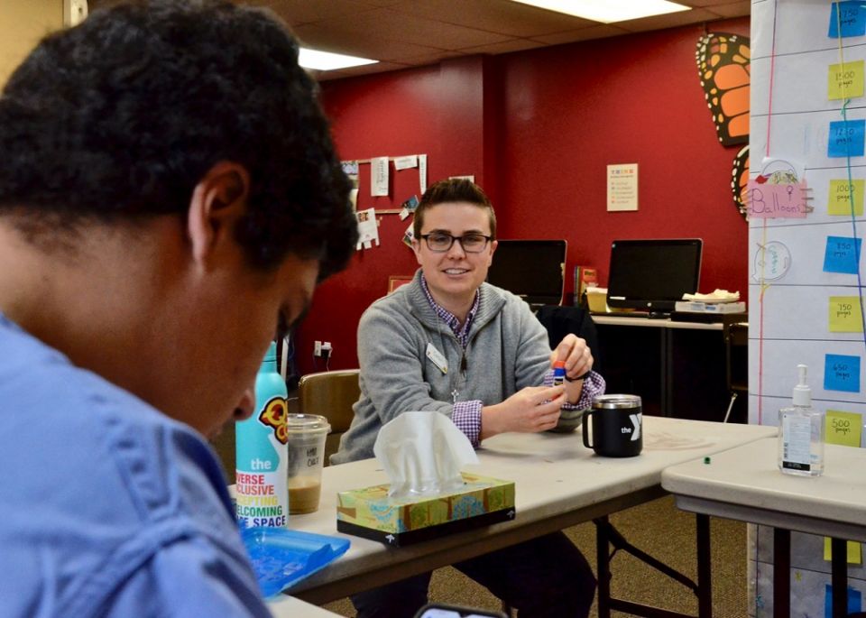 Troy (not his real name), left, is a client at YMCA Safe Place Services in Louisville, Kentucky, where Providence Sr. Corbin Hannah, right, is youth development coordinator. (GSR file photo)