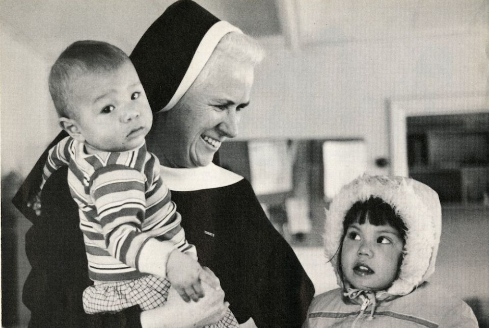 St. Joseph Sr. Mary Christine Taylor, a Sister of St. Joseph of Watertown, New York, with two children from the Mohawk Tribe on the St. Regis Mohawk Reservation in 1984 (Courtesy of Catholic Extension Magazine) St. Joseph Sr. Mary Christine Taylor, a Sister of St. Joseph of Watertown, New York, with two children from the Mohawk Tribe on the St. Regis Mohawk Reservation in 1984 (Courtesy of Catholic Extension Magazine)