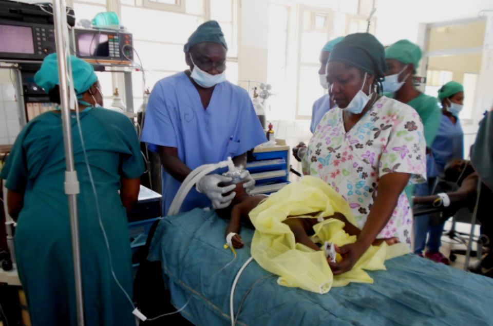 Sr. Mary Margaret Ajiko readies to conduct surgery on a baby at Soroti Regional Referral Hospital. (Gerald Matembu)