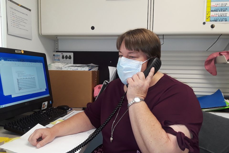 Sr. Michelle Woodruff of the Adorers of the Blood of Christ calls contacts of people who have tested positive for COVID-19 in April. She is a public health nurse at Crownpoint Health Care Facility in New Mexico. (Provided photo)